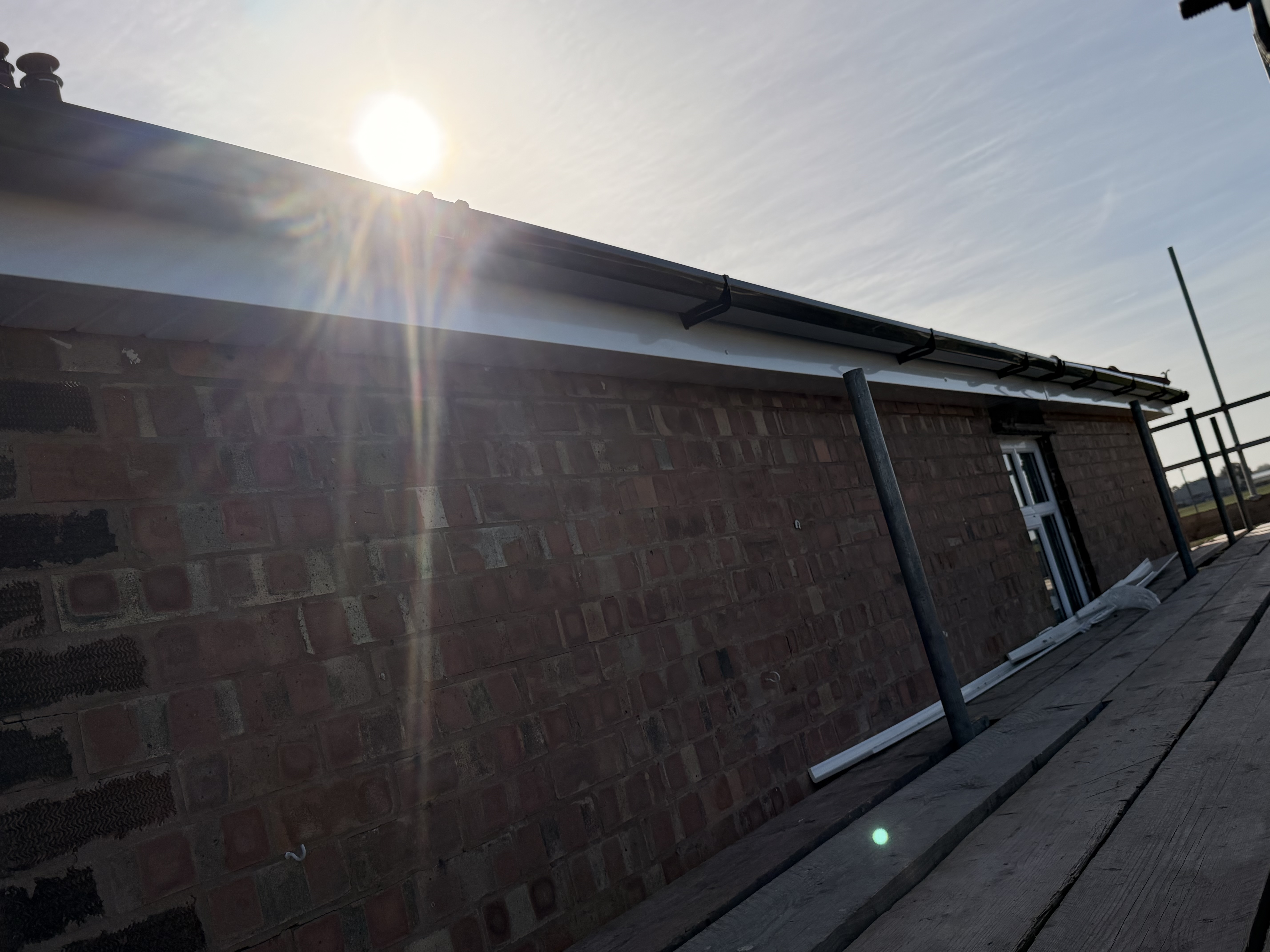 Roof edge and brick side elevation after the work