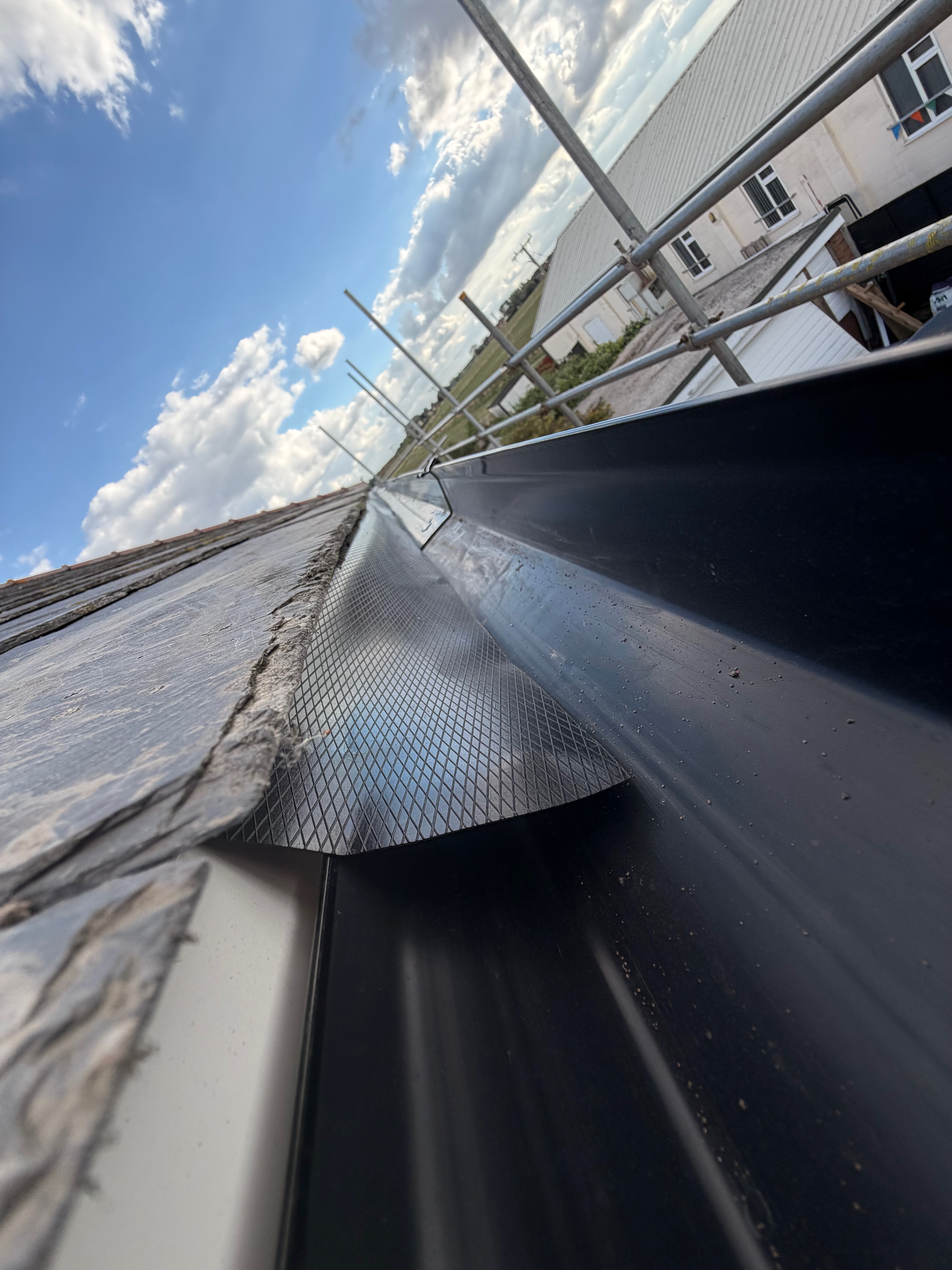 Dark roof edge and rainwater detail