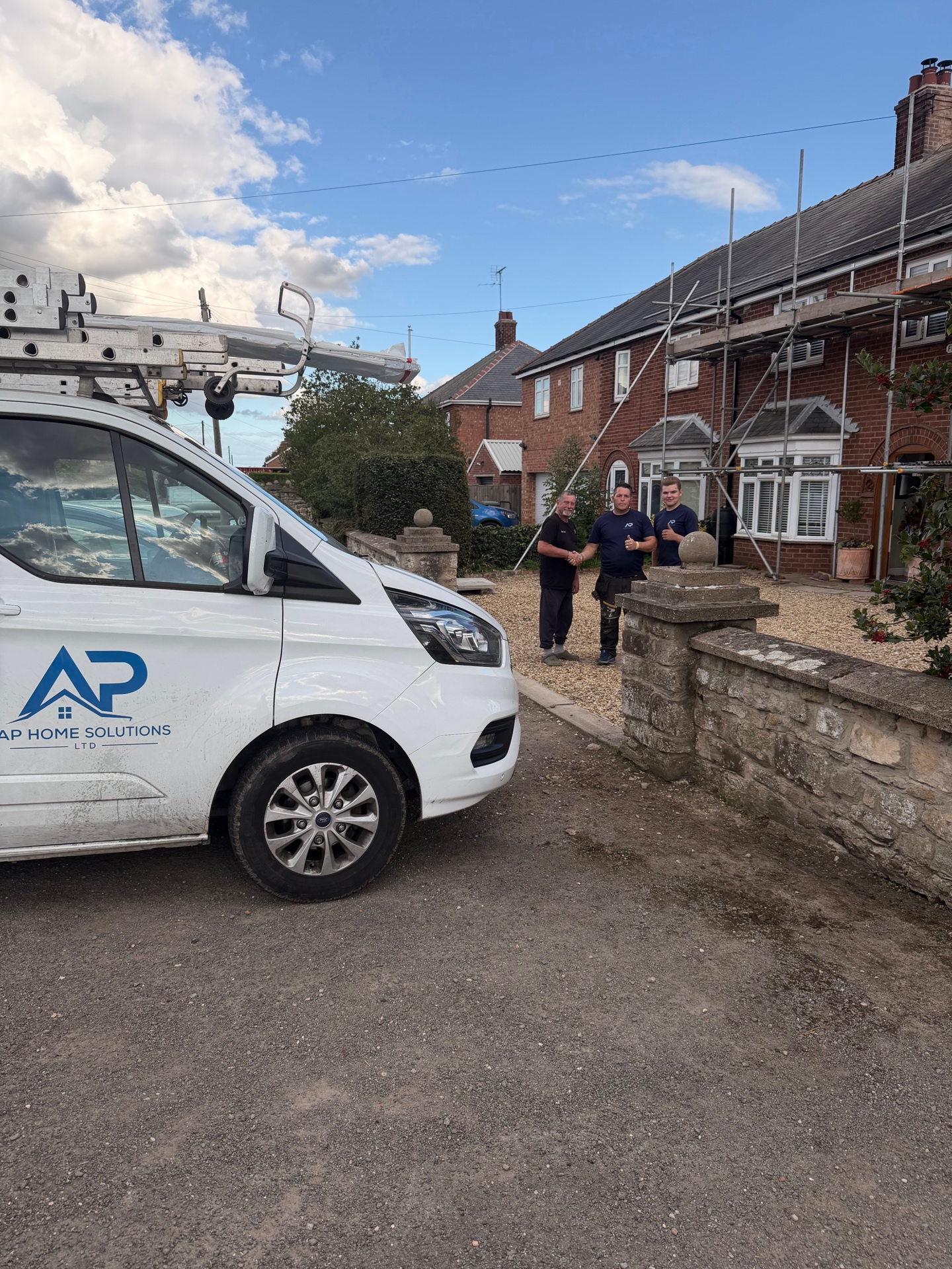 AP Home Solutions branded van at the completed project
